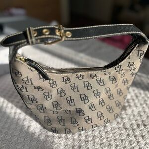 Dooney &  Bourke Signature Bucket Black & White Small Bucket Bag.